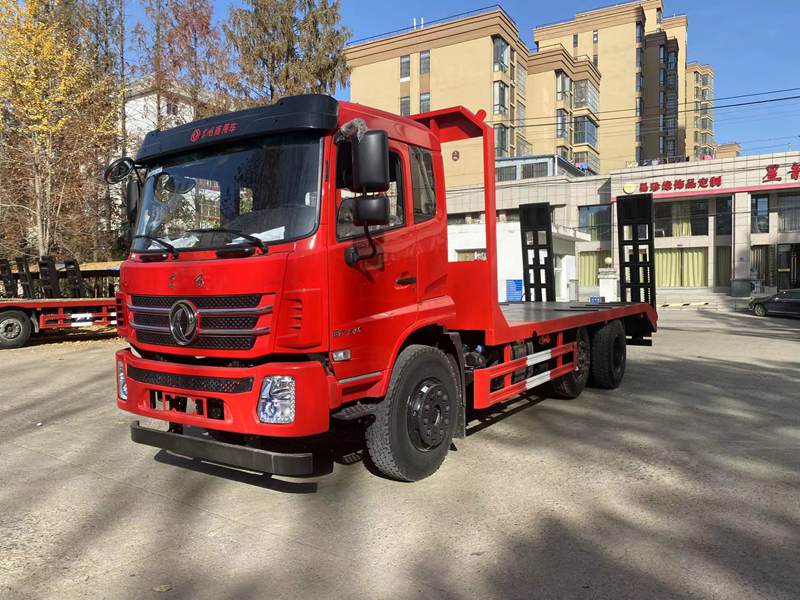 東風D17三軸提升橋玉柴245馬力平板車